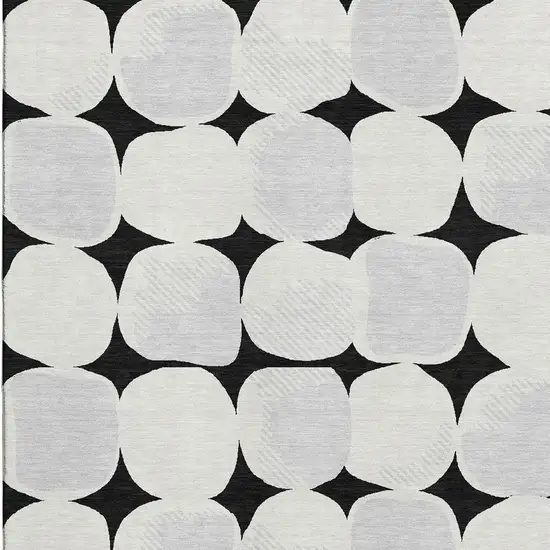 Black And Ivory Abstract Geometric Washable Area Rug With UV Protection Photo 3