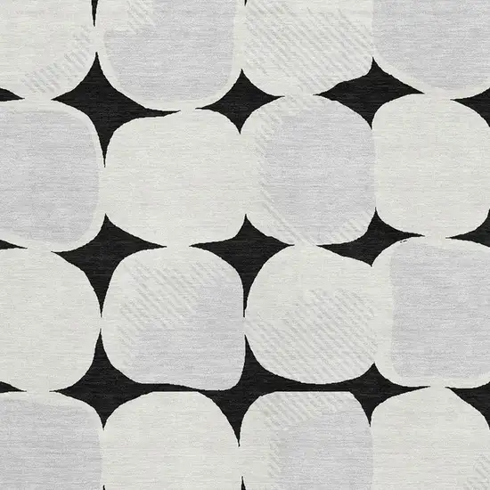 Black And Ivory Abstract Geometric Washable Area Rug With UV Protection Photo 3