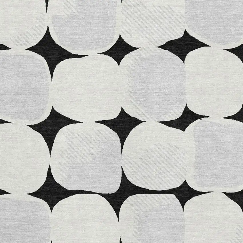 Black And Ivory Abstract Geometric Washable Area Rug With UV Protection Photo 3