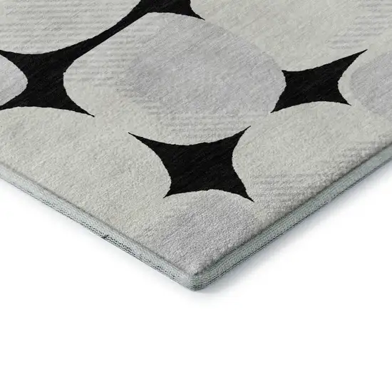 Black And Ivory Abstract Geometric Washable Area Rug With UV Protection Photo 8
