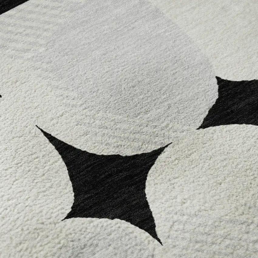 Black And Ivory Abstract Geometric Washable Area Rug With UV Protection Photo 9