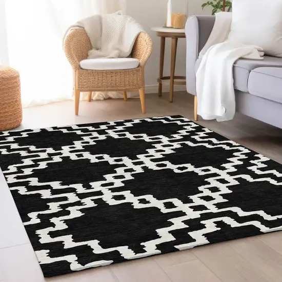 Black And Ivory Abstract Geometric Washable Area Rug With UV Protection Photo 4