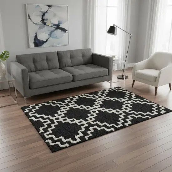Black And Ivory Abstract Geometric Washable Area Rug With UV Protection Photo 2