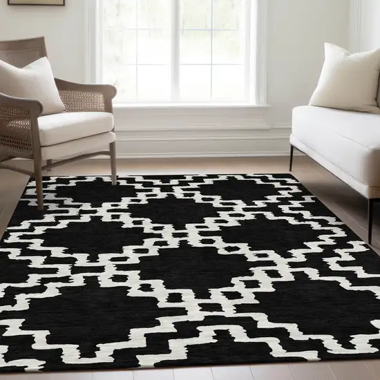 Black And Ivory Abstract Geometric Washable Area Rug With UV Protection Photo 5