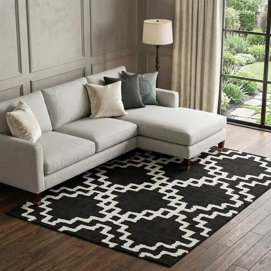 Black And Ivory Abstract Geometric Washable Area Rug With UV Protection Photo 1
