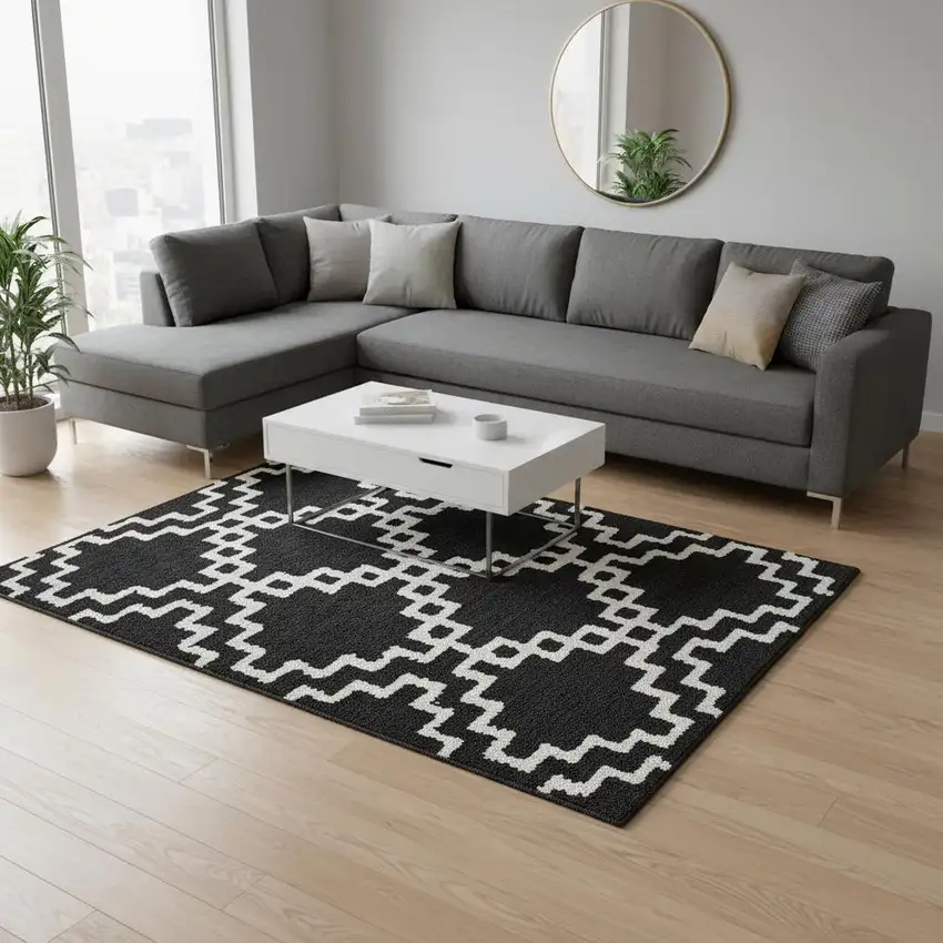 Black And Ivory Abstract Geometric Washable Area Rug With UV Protection Photo 2