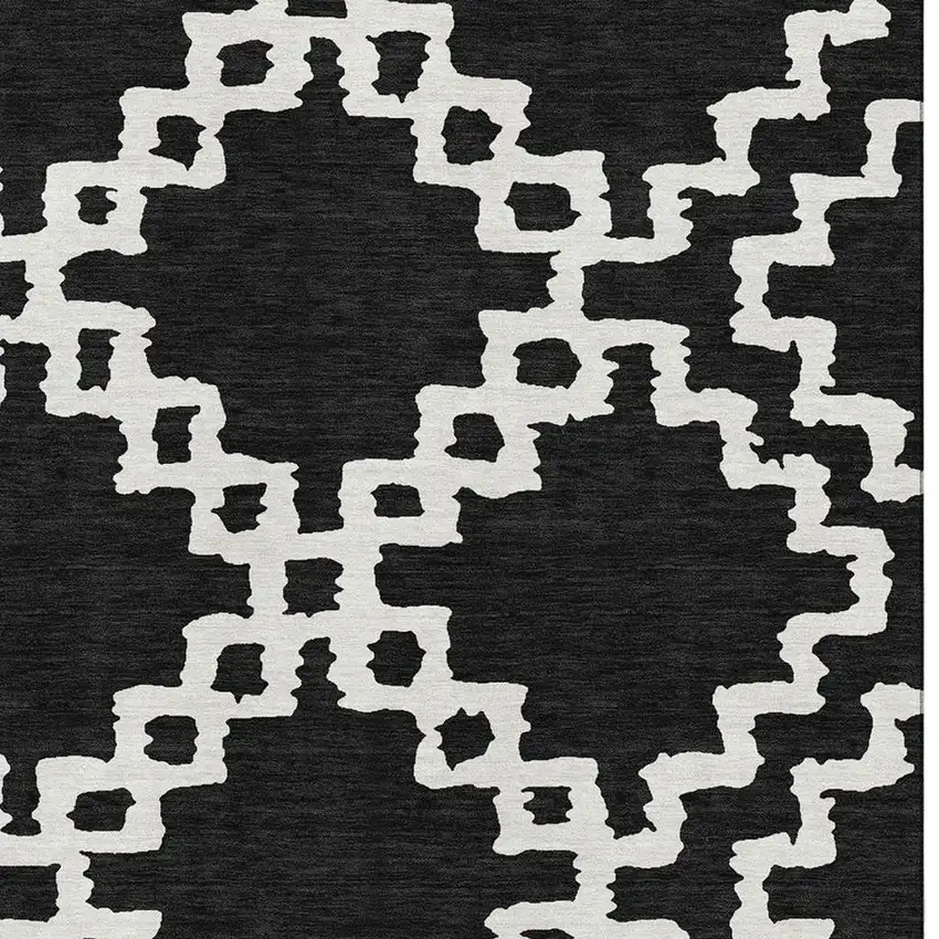 Black And Ivory Abstract Geometric Washable Area Rug With UV Protection Photo 3