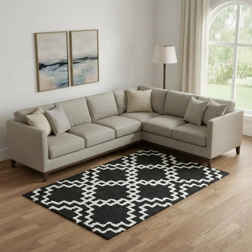 Black And Ivory Abstract Geometric Washable Area Rug With UV Protection Photo 1