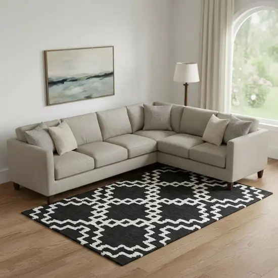 Black And Ivory Abstract Geometric Washable Area Rug With UV Protection Photo 1