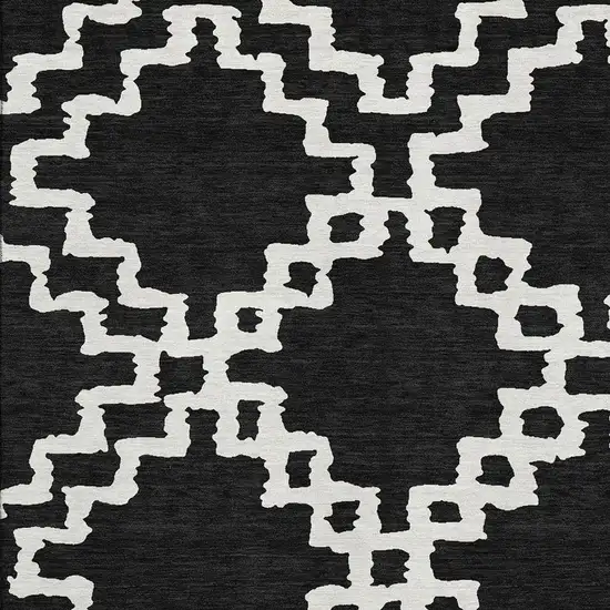 Black And Ivory Abstract Geometric Washable Area Rug With UV Protection Photo 3