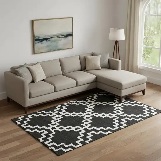 Black And Ivory Abstract Geometric Washable Area Rug With UV Protection Photo 1