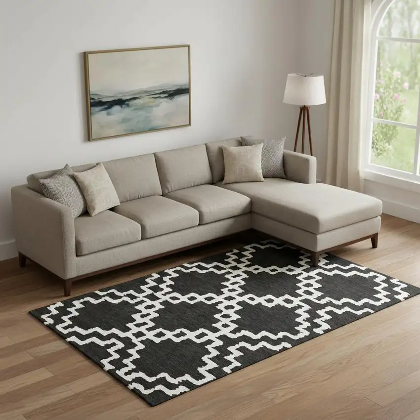Black And Ivory Abstract Geometric Washable Area Rug With UV Protection Photo 1