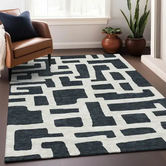 Black And Ivory Abstract Geometric Washable Area Rug With UV Protection Photo 4