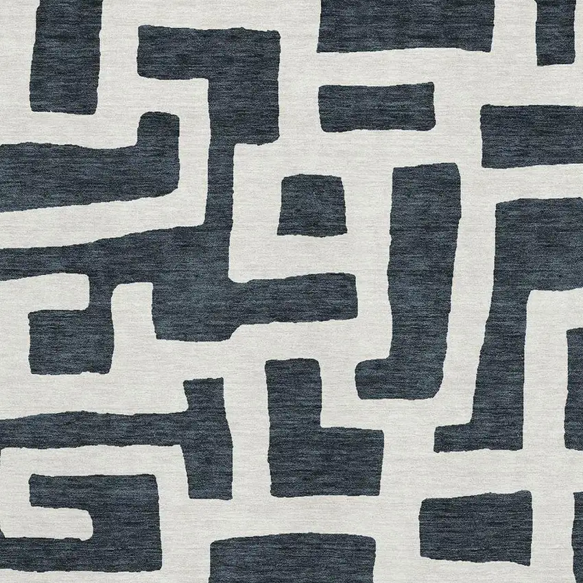 Black And Ivory Abstract Geometric Washable Area Rug With UV Protection Photo 3