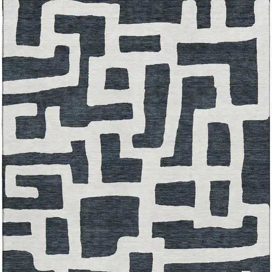 Black And Ivory Abstract Geometric Washable Area Rug With UV Protection Photo 4