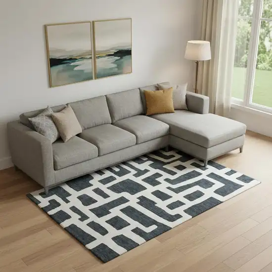 Black And Ivory Abstract Geometric Washable Area Rug With UV Protection Photo 1