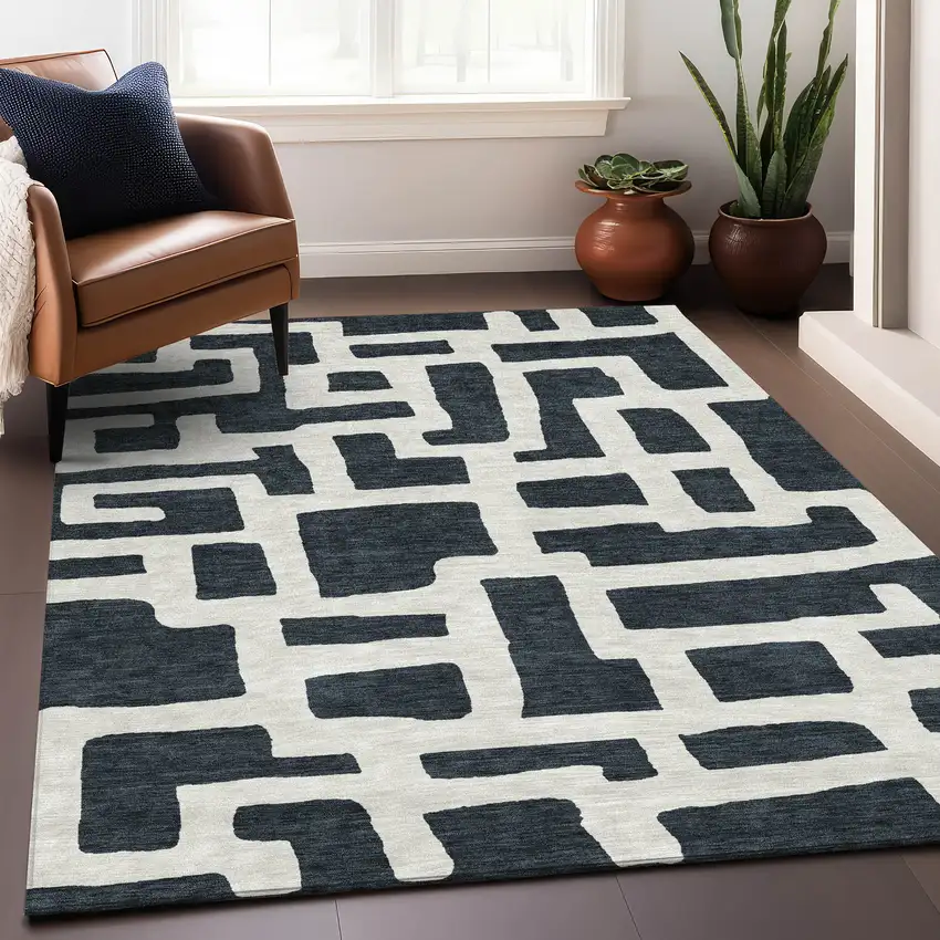 Black And Ivory Abstract Geometric Washable Area Rug With UV Protection Photo 4
