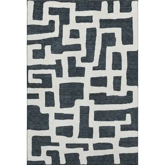 Black And Ivory Abstract Geometric Washable Area Rug With UV Protection Photo 1