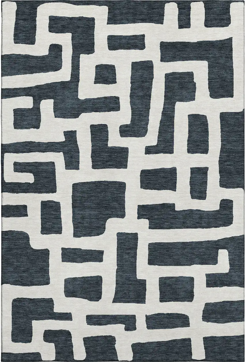 Black And Ivory Abstract Geometric Washable Area Rug With UV Protection Photo 1