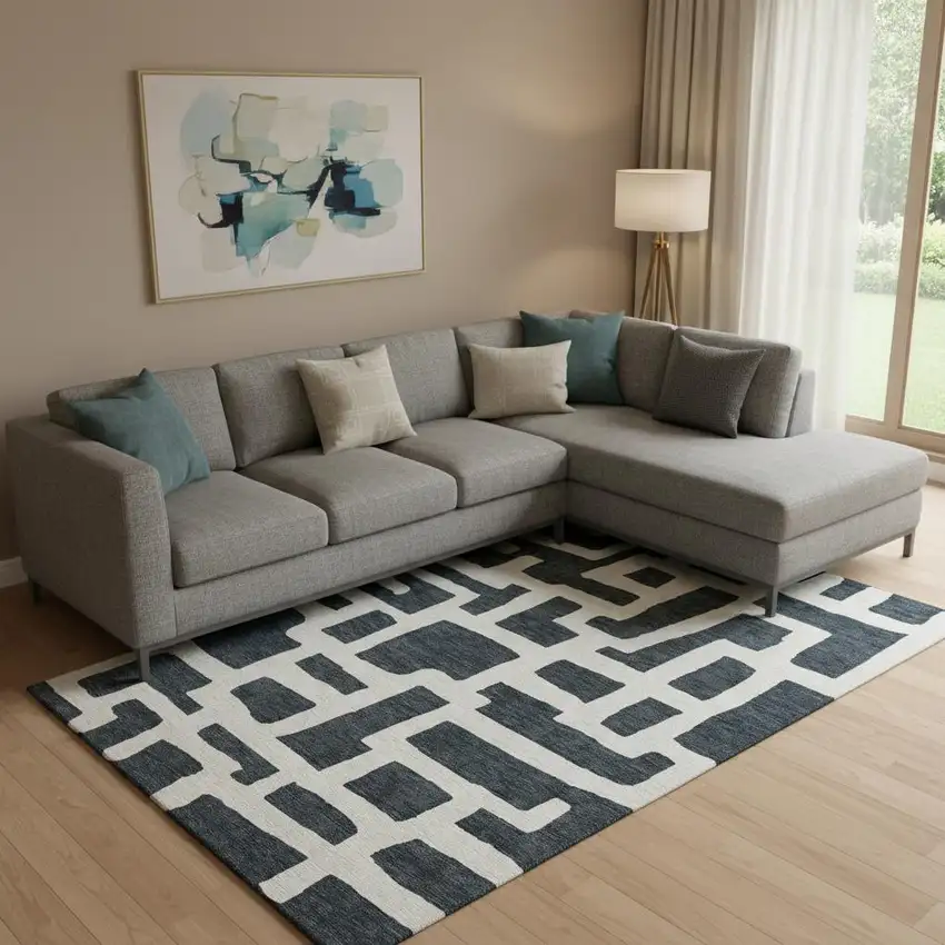 Black And Ivory Abstract Geometric Washable Area Rug With UV Protection Photo 1