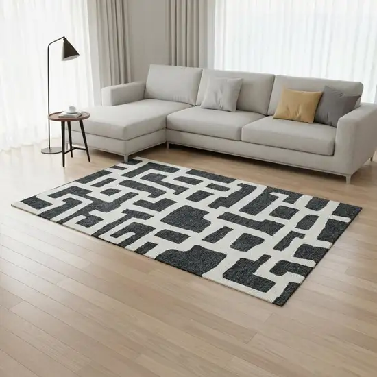 Black And Ivory Abstract Geometric Washable Area Rug With UV Protection Photo 2