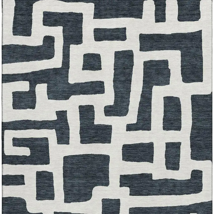 Black And Ivory Abstract Geometric Washable Area Rug With UV Protection Photo 4