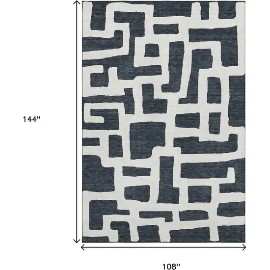 Black And Ivory Abstract Geometric Washable Area Rug With UV Protection Photo 3