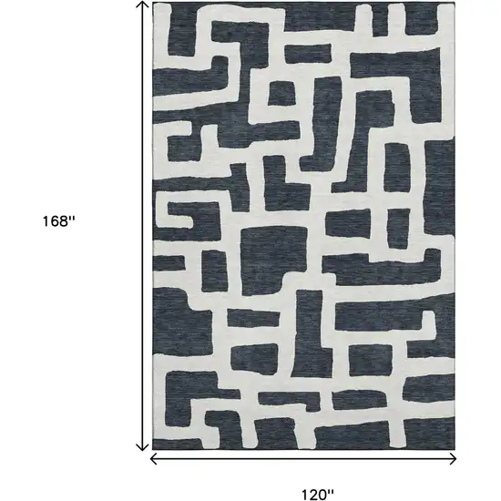 Black And Ivory Abstract Geometric Washable Area Rug With UV Protection Photo 3
