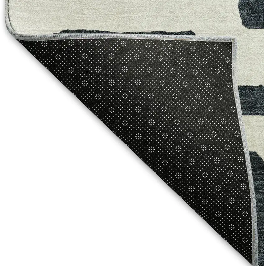 Black And Ivory Abstract Geometric Washable Area Rug With UV Protection Photo 7