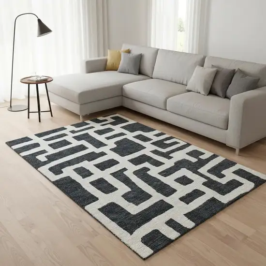 Black And Ivory Abstract Geometric Washable Area Rug With UV Protection Photo 2