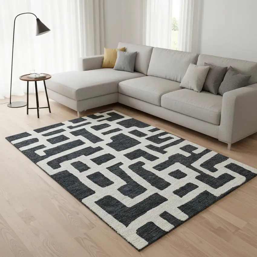 Black And Ivory Abstract Geometric Washable Area Rug With UV Protection Photo 2