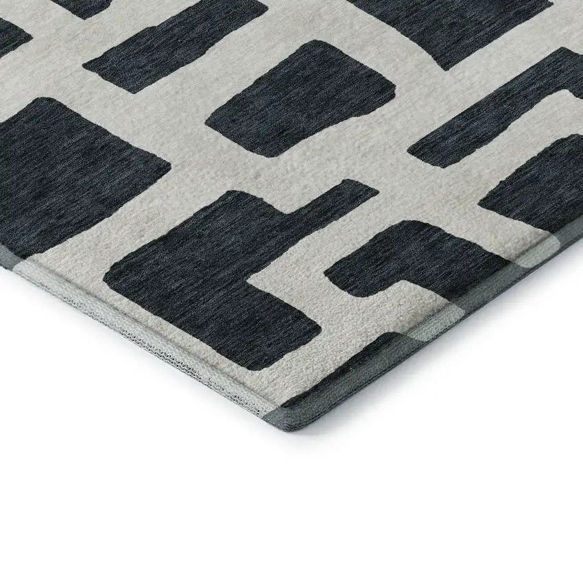 Black And Ivory Abstract Geometric Washable Area Rug With UV Protection Photo 8