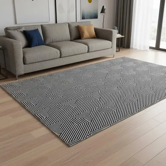 Black And Ivory Abstract Geometric Washable Area Rug With UV Protection Photo 2