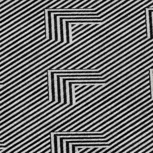 Photo of Black And Ivory Abstract Geometric Washable Area Rug With UV Protection