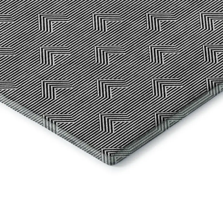 Black And Ivory Abstract Geometric Washable Area Rug With UV Protection Photo 1