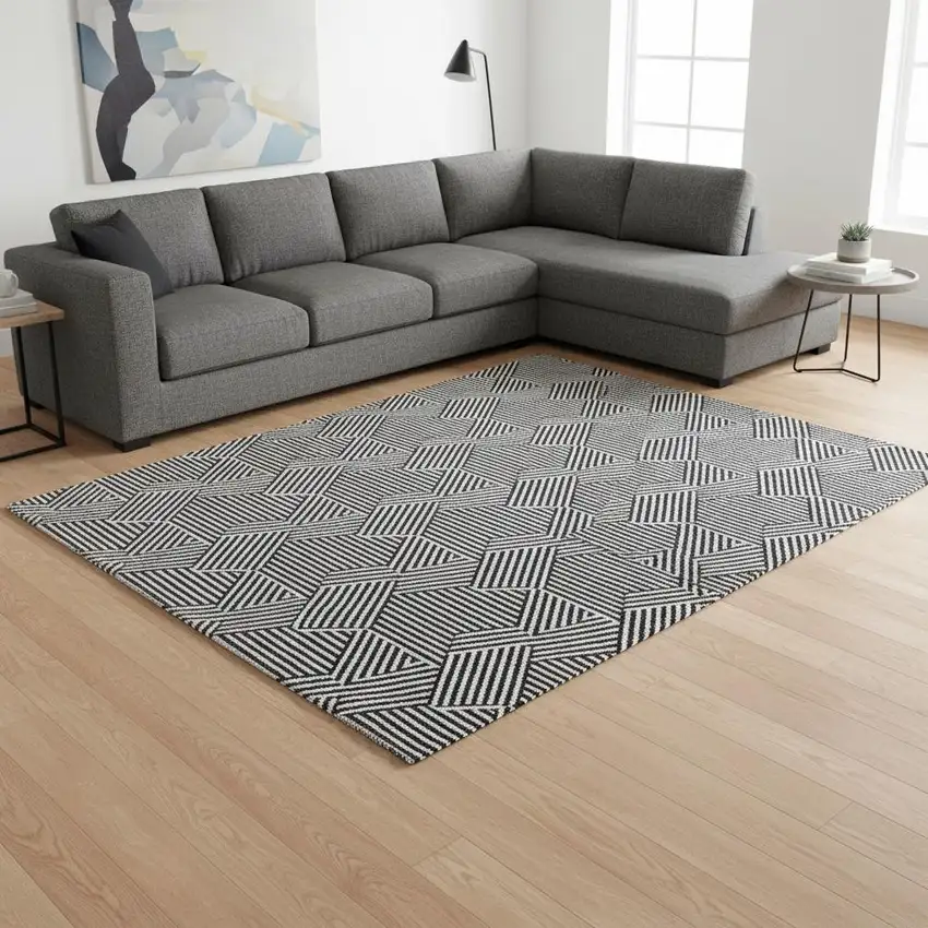 Black And Ivory Abstract Geometric Washable Area Rug With UV Protection Photo 2