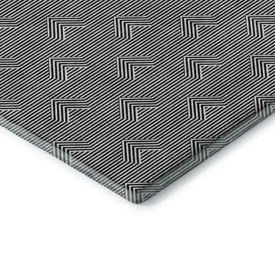 Black And Ivory Abstract Geometric Washable Area Rug With UV Protection Photo 1
