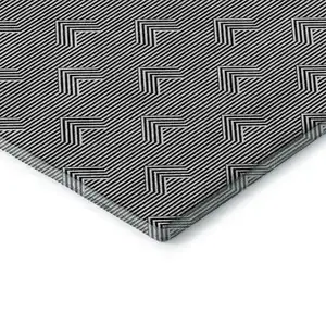Photo of Black And Ivory Abstract Geometric Washable Area Rug With UV Protection