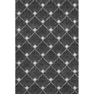 Photo of Black And Ivory Abstract Geometric Washable Area Rug With UV Protection