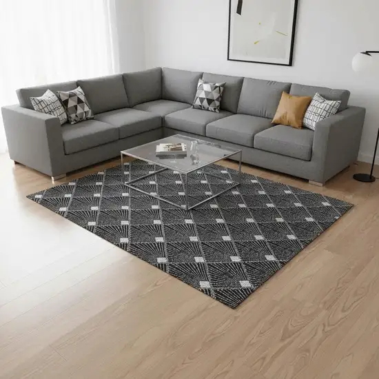 Black And Ivory Abstract Geometric Washable Area Rug With UV Protection Photo 2