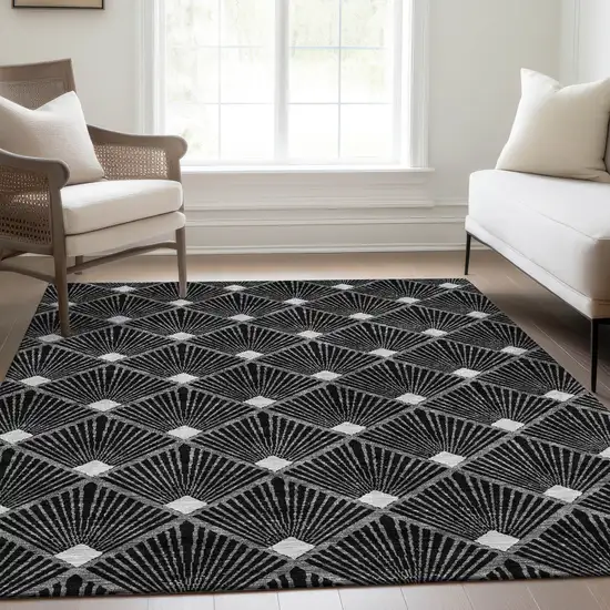 Black And Ivory Abstract Geometric Washable Area Rug With UV Protection Photo 6