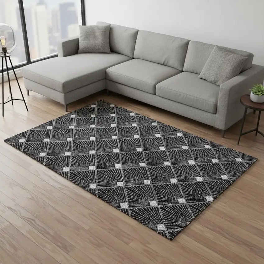 Black And Ivory Abstract Geometric Washable Area Rug With UV Protection Photo 2