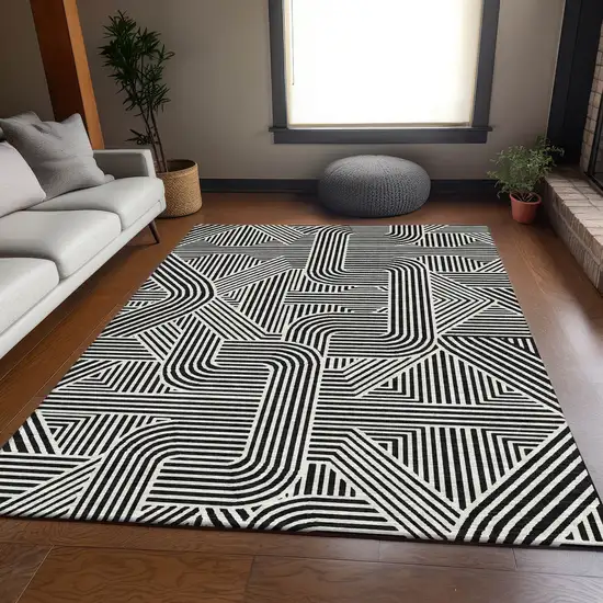 Black And Ivory Abstract Geometric Washable Area Rug With UV Protection Photo 6