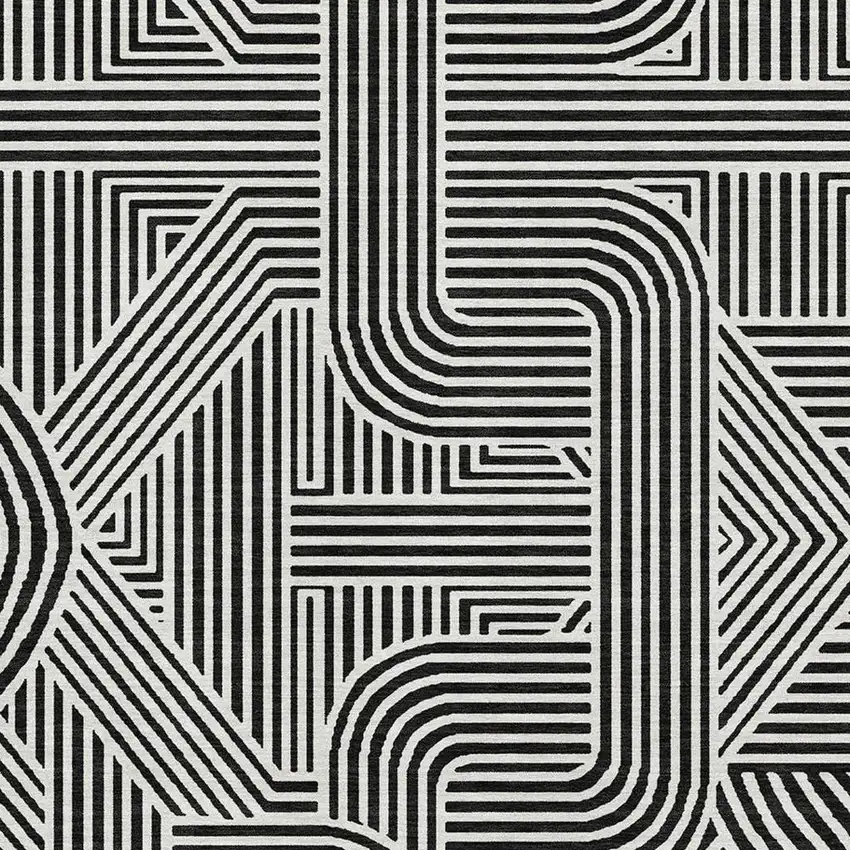 Black And Ivory Abstract Geometric Washable Area Rug With UV Protection Photo 3