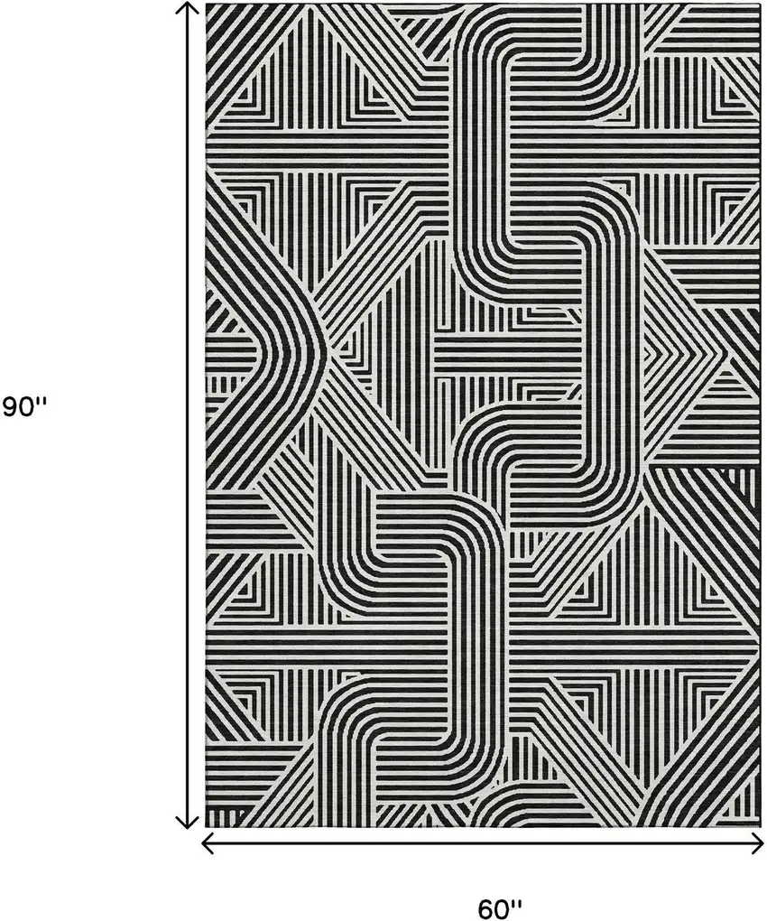 Black And Ivory Abstract Geometric Washable Area Rug With UV Protection Photo 3