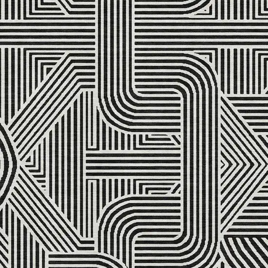 Black And Ivory Abstract Geometric Washable Area Rug With UV Protection Photo 3