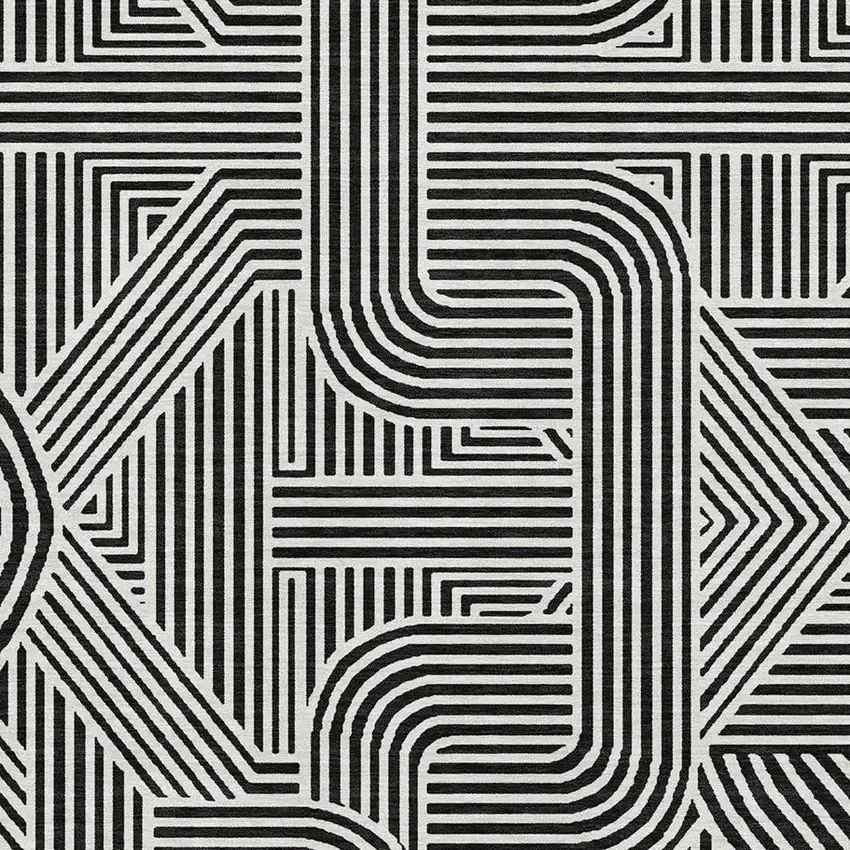 Black And Ivory Abstract Geometric Washable Area Rug With UV Protection Photo 3