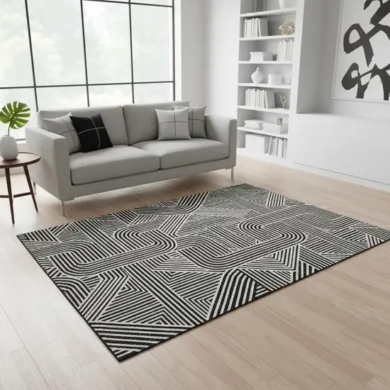 Black And Ivory Abstract Geometric Washable Area Rug With UV Protection Photo 2