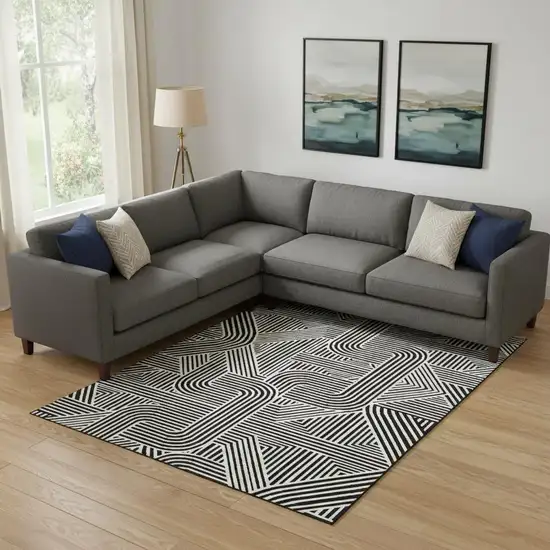 Black And Ivory Abstract Geometric Washable Area Rug With UV Protection Photo 1