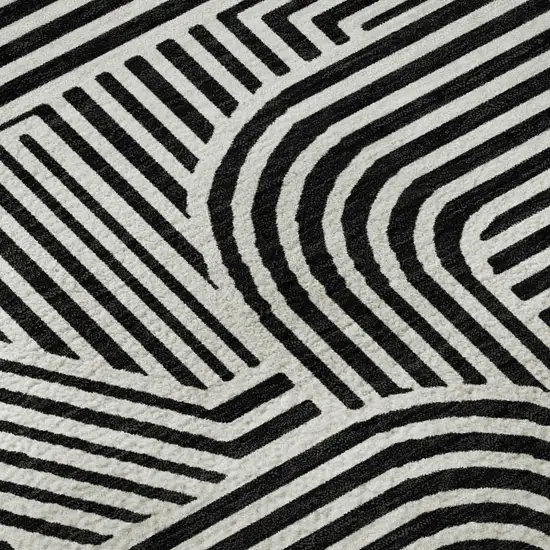 Black And Ivory Abstract Geometric Washable Area Rug With UV Protection Photo 9